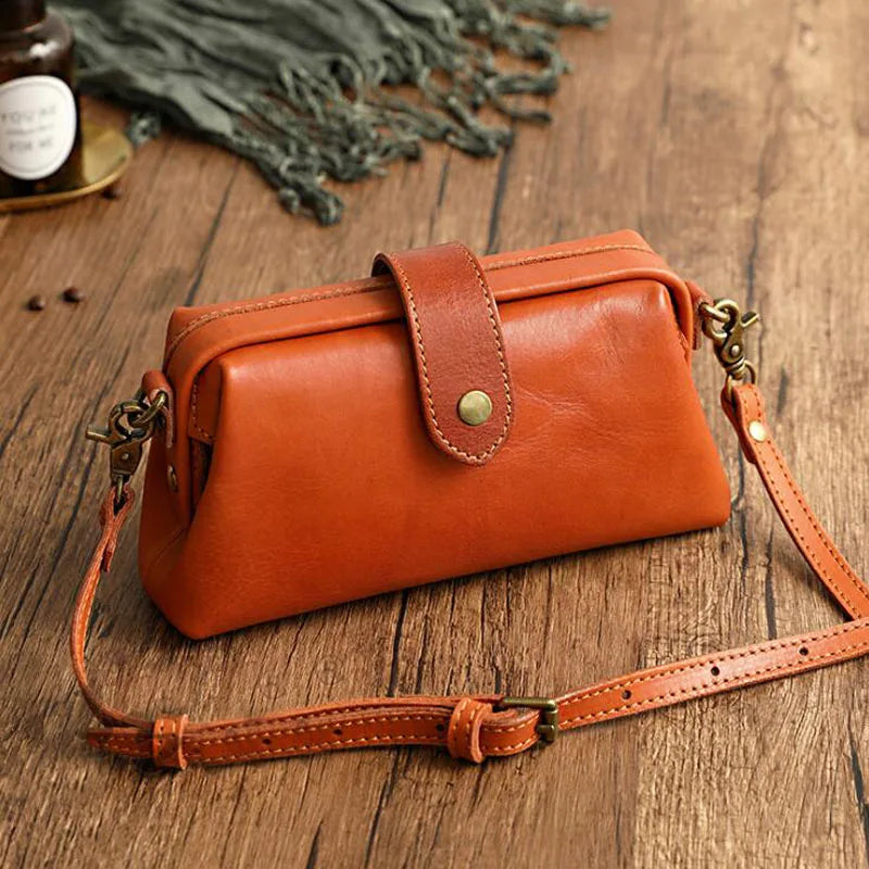 Herdis | Bolsa clásica y compacta en cálido tono cognac