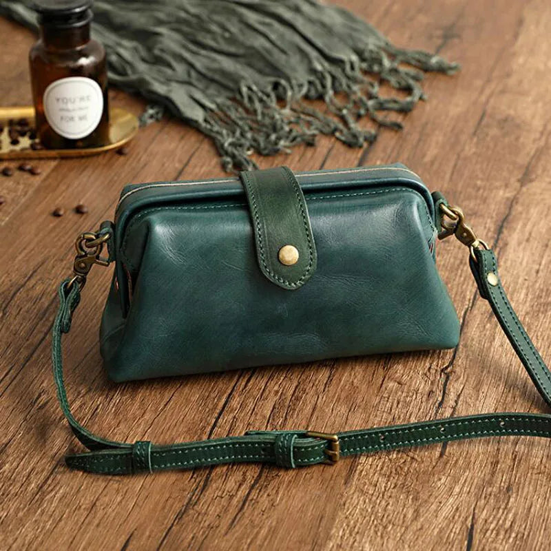 Herdis | Bolsa clásica y compacta en cálido tono cognac