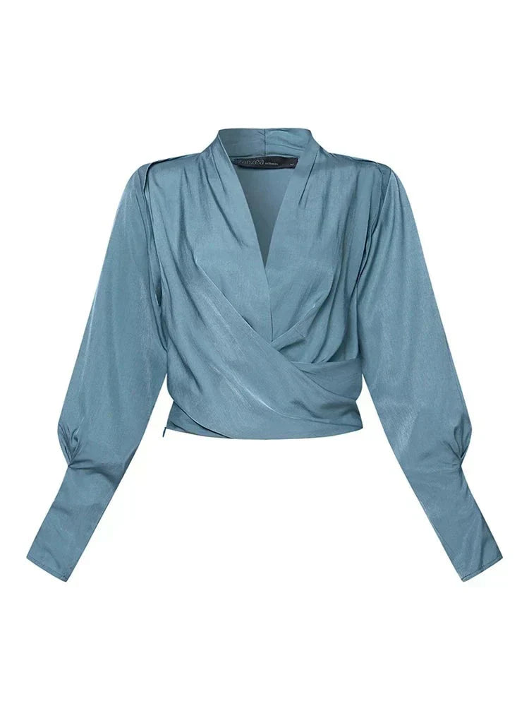 CASSANDRA – BLUSA ELEGANTE CON ESCOTE EN V DRAPEADO