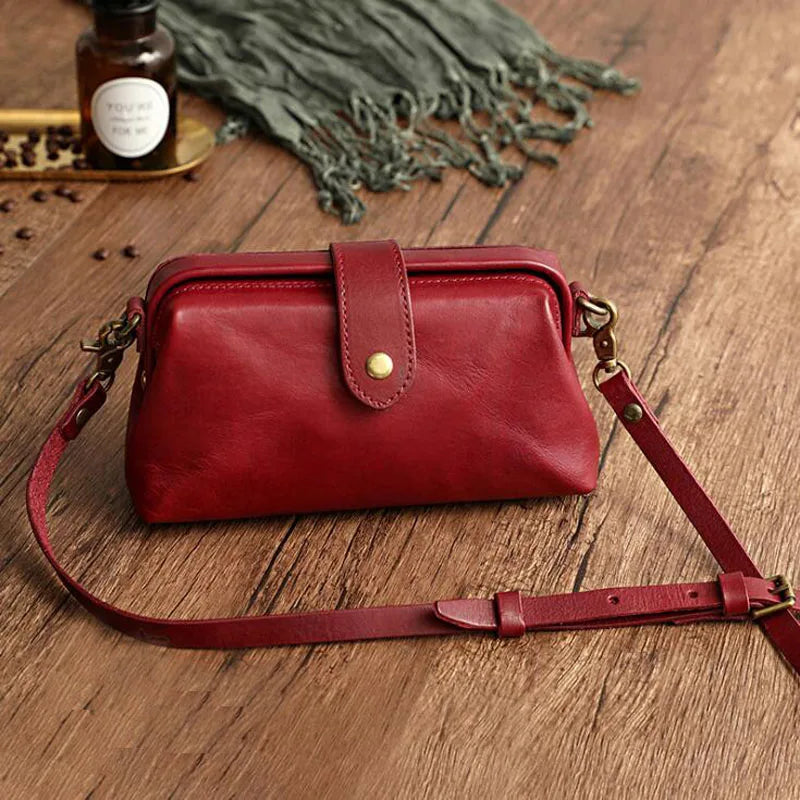 Herdis | Bolsa clásica y compacta en cálido tono cognac