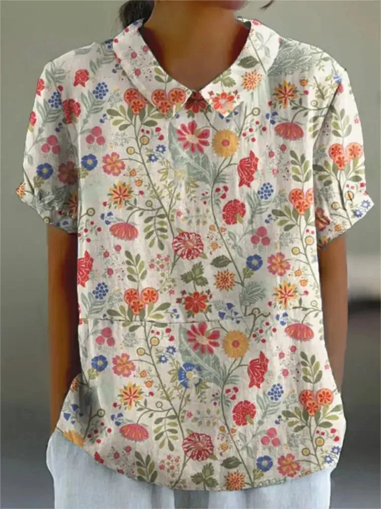 Carmina | Blusa elegante con flores