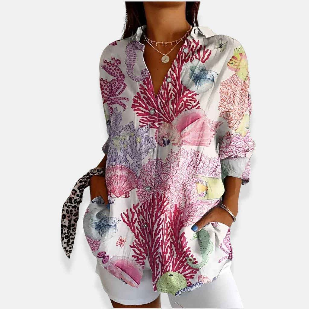 LYSSA™ | Blusa floral con cierre de botones