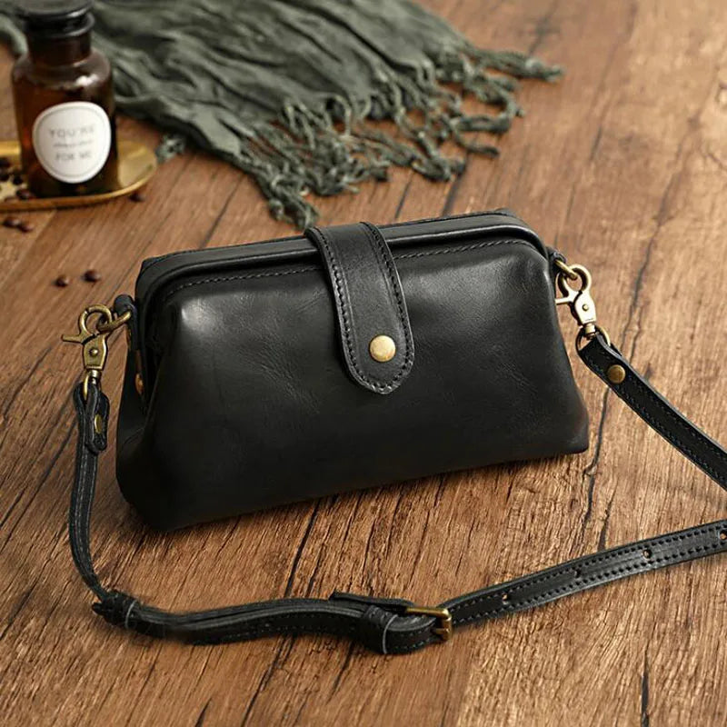 Herdis | Bolsa clásica y compacta en cálido tono cognac